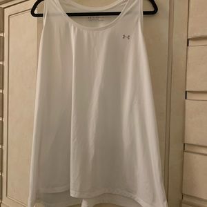 Women’s Under Armour Racer Tank. 28 in long. 100% Polyester. Headgear.